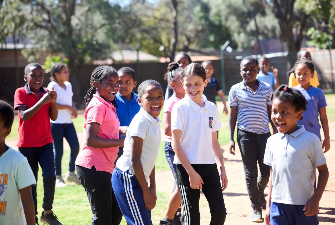 Children playing outdoors at Brackenkidz aftercare Brackenhurst Alberton